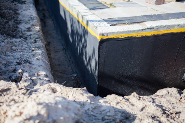 Professional Waterproofing technician working in Glenview, IL